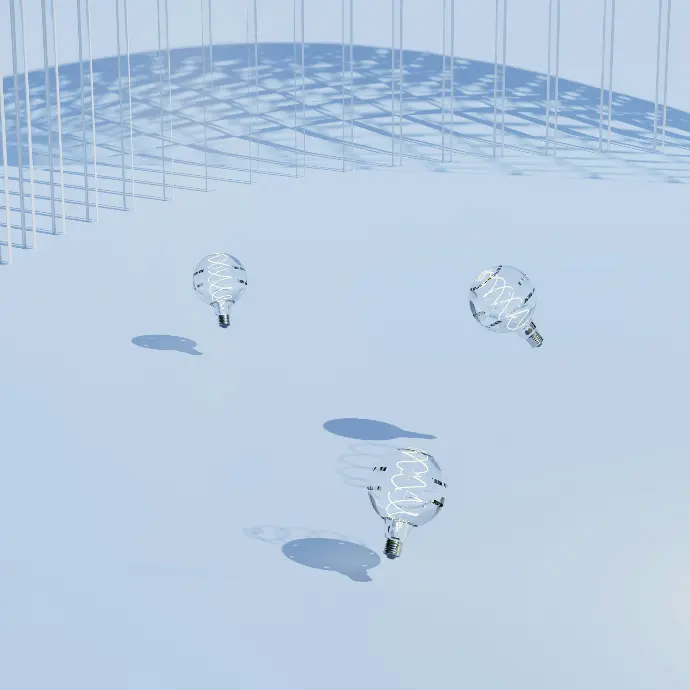 a group of light bulbs sitting on top of a snow covered ground